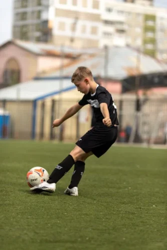 player kicking ball