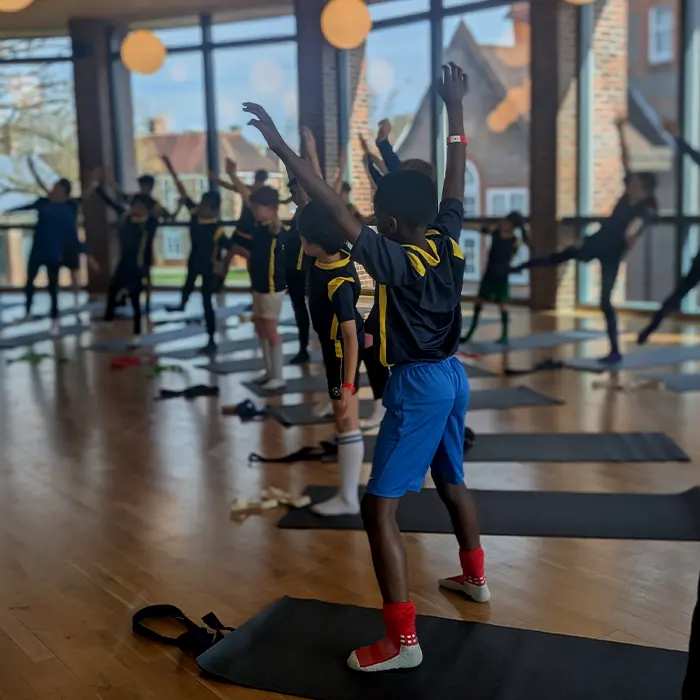 repsfootball_residential_football_camps_sports yoga football c